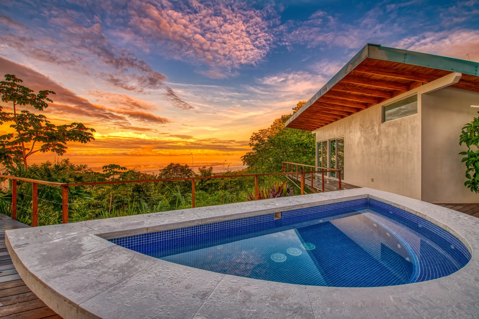 Plunge pool and jacuzzi at sunset