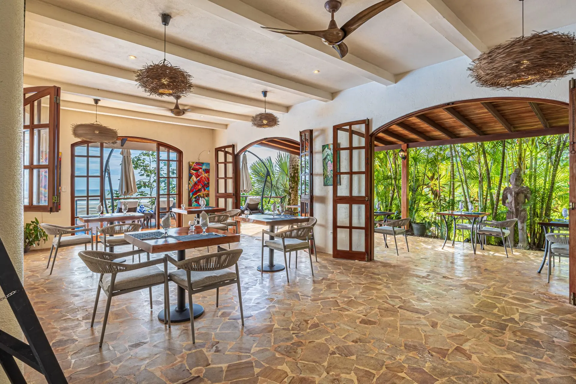 Open-air dining room above the jungle and Pacific